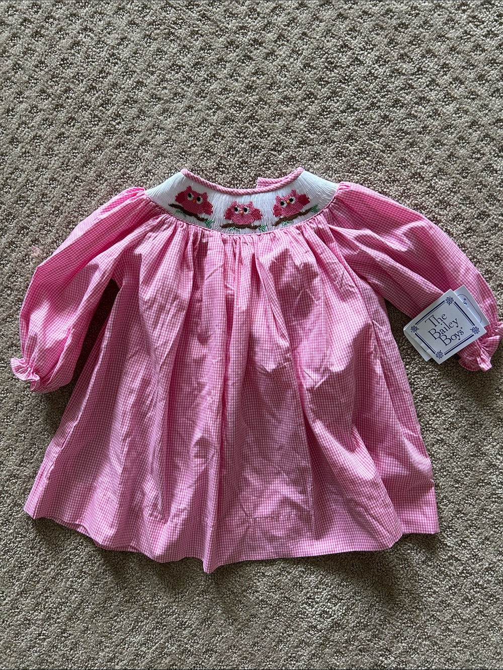 Pink Smocked Gingham Kids Dress with Floral Motif